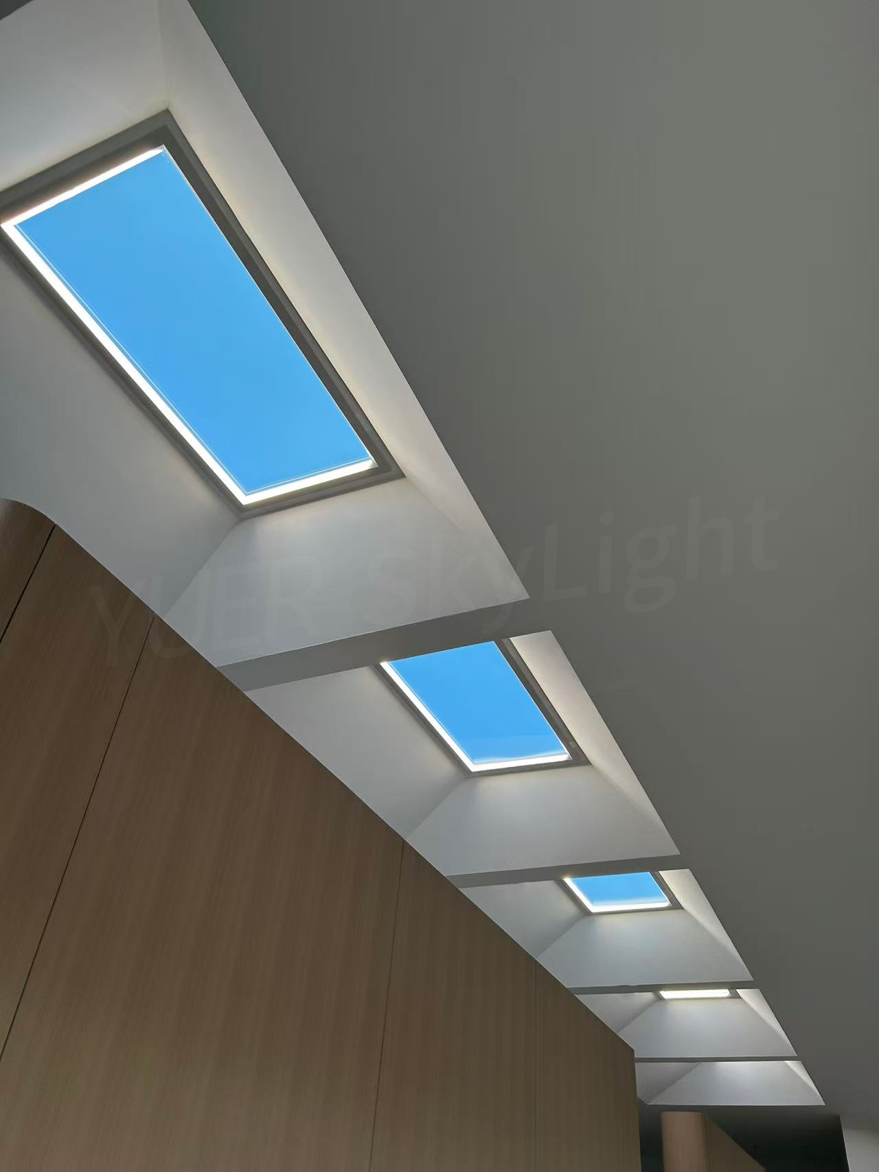 An internal windowless room lit as though by natural daylight